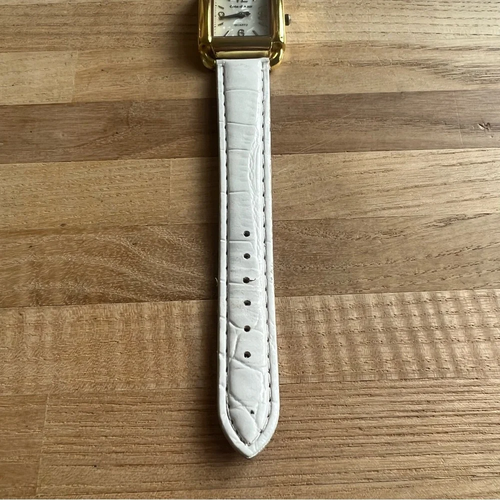 Côte d azur ladies white dial gold tone dress watch NEW BATTERY